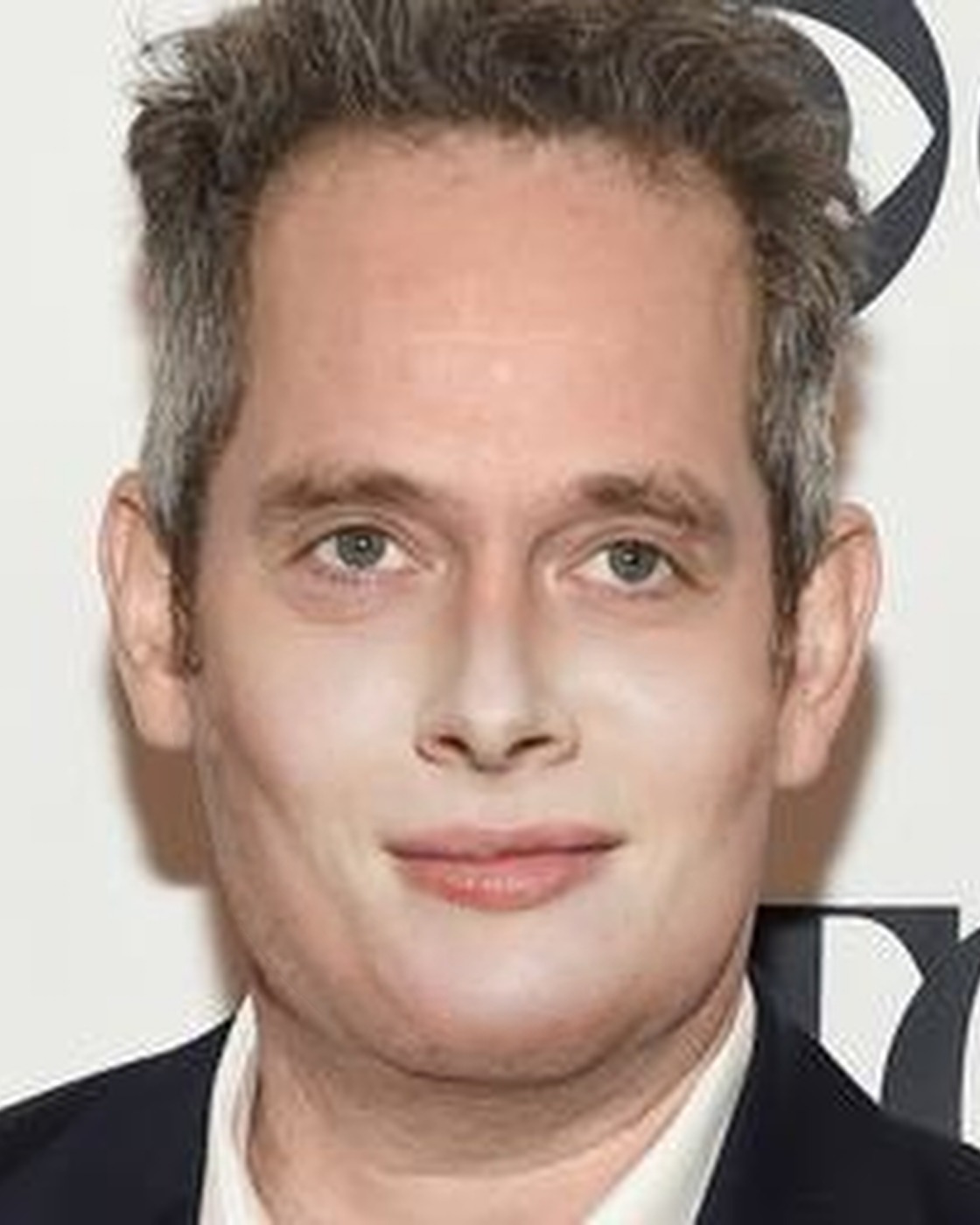 The full photo of Tom Hollander